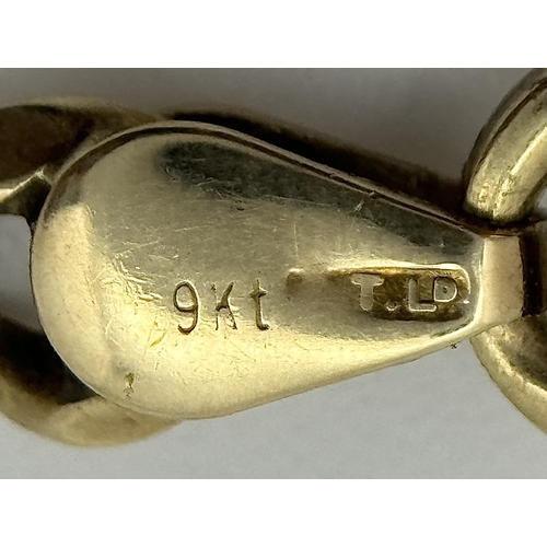 57 - A 9K Yellow Gold Flat Curb Link Chain necklace. 50cm. 14g.