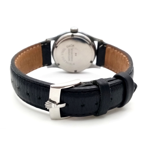 61 - A Gents Rolex Marconi special watch. In working order, rare black dial.  Hallmarked inner case RWC (... 