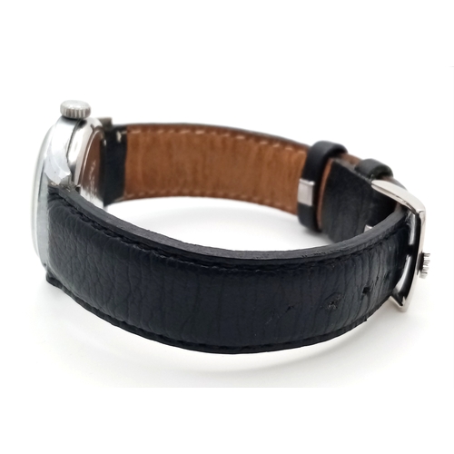 61 - A Gents Rolex Marconi special watch. In working order, rare black dial.  Hallmarked inner case RWC (... 