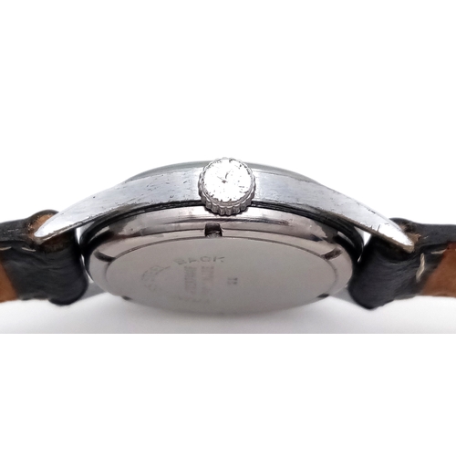 61 - A Gents Rolex Marconi special watch. In working order, rare black dial.  Hallmarked inner case RWC (... 