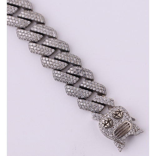 115 - A HEAD TURNING 9K WHITE GOLD,FANCY LINK DIAMOND CLUSTER BRACELET. 7.50CTW OF DIAMONDS, H-I COLOUR, S... 