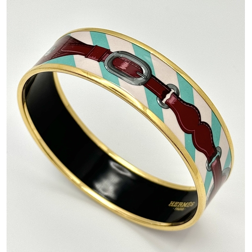 780 - An Hermes Colourful Decorative Enamel and Gilded Metal Bangle. 20mm width. 62mm inner diameter.  Ref... 