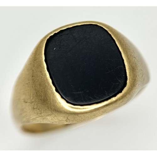 148 - A Vintage 9K Yellow Gold Black Onyx Signet Ring. Size V. 3.4g.