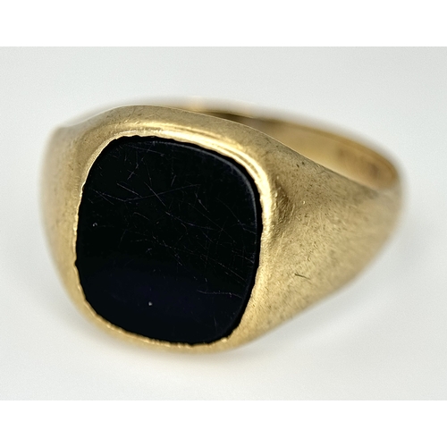 148 - A Vintage 9K Yellow Gold Black Onyx Signet Ring. Size V. 3.4g.