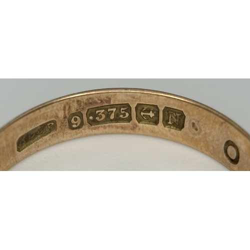 561 - A 9K Rose Gold Band Ring. 5mm width. Size O. 1.25g