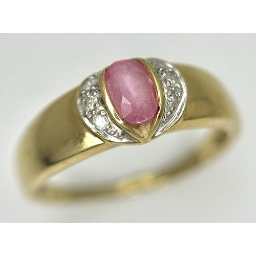 582 - A 9K Yellow Gold Pink Stone and Diamond Ring. Size P 1/2. 2.93g