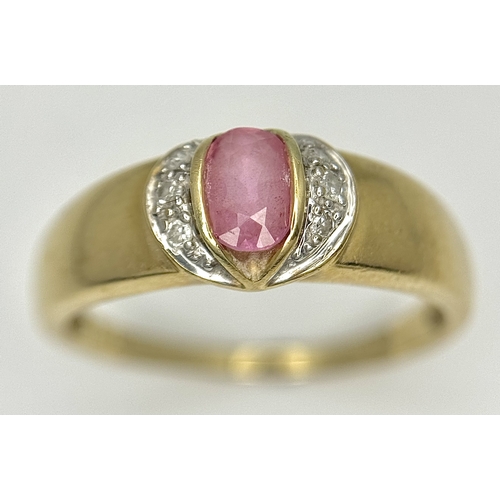 582 - A 9K Yellow Gold Pink Stone and Diamond Ring. Size P 1/2. 2.93g