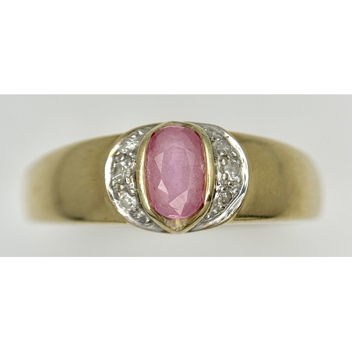 582 - A 9K Yellow Gold Pink Stone and Diamond Ring. Size P 1/2. 2.93g