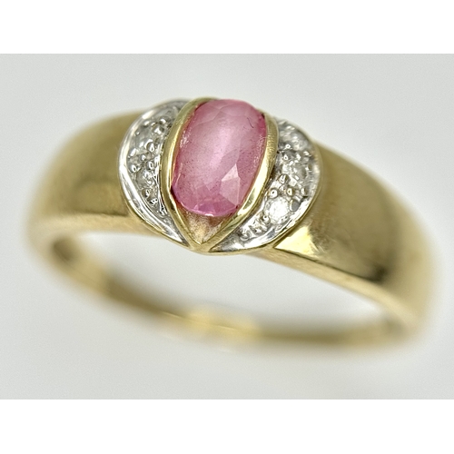 582 - A 9K Yellow Gold Pink Stone and Diamond Ring. Size P 1/2. 2.93g