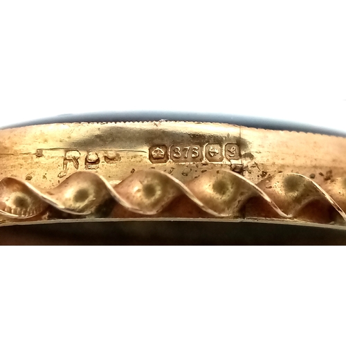 239 - A 9K Yellow Gold Opal Doublet Pendant. Nice colour play. 3cm. 2.1g.