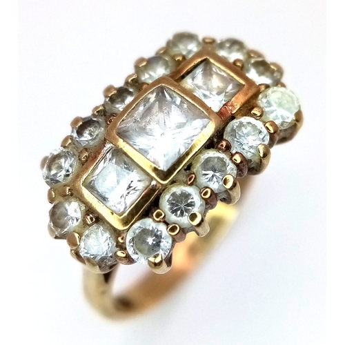 541 - A 9K Yellow Gold, White Zircon Ring. Size M. 3.52g.