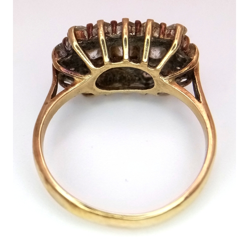 541 - A 9K Yellow Gold, White Zircon Ring. Size M. 3.52g.