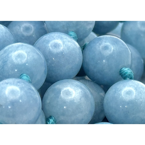 240 - A Three Row Aquamarine Beaded Necklace. 10mm beads. 42-46cm necklace length.