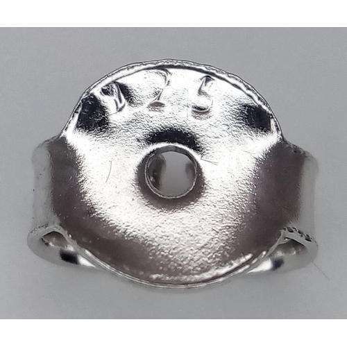 543 - A Pair of Green Sapphire Stud Earrings. Diamond accents. Set in 925 Silver. Comes with a case. CD-19... 