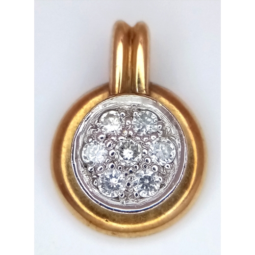 550 - A 9K Yellow Gold and Diamond Pendant. 1.5cm. 2.77g.
