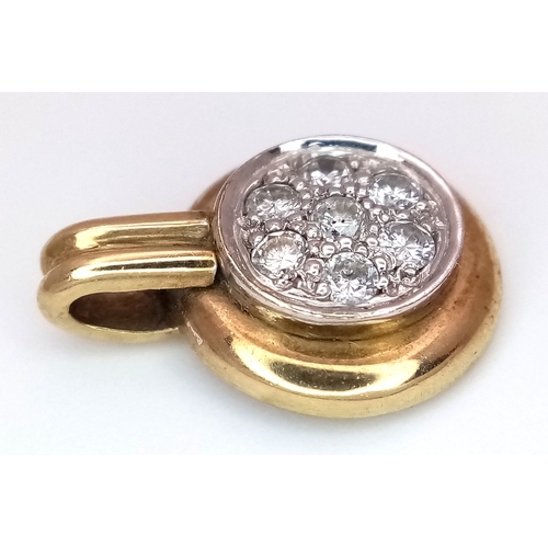 550 - A 9K Yellow Gold and Diamond Pendant. 1.5cm. 2.77g.