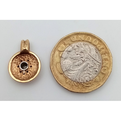 550 - A 9K Yellow Gold and Diamond Pendant. 1.5cm. 2.77g.