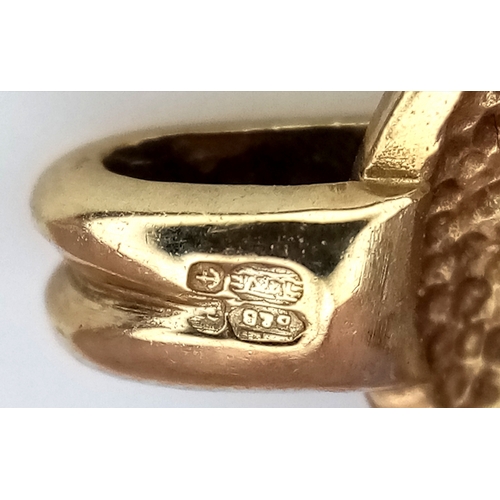 550 - A 9K Yellow Gold and Diamond Pendant. 1.5cm. 2.77g.