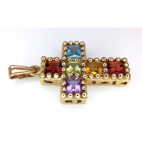 577 - A 10K Yellow Gold Multi Gem-set Cross Pendant. 2.5cm. 1.5g.