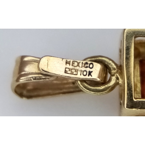 577 - A 10K Yellow Gold Multi Gem-set Cross Pendant. 2.5cm. 1.5g.