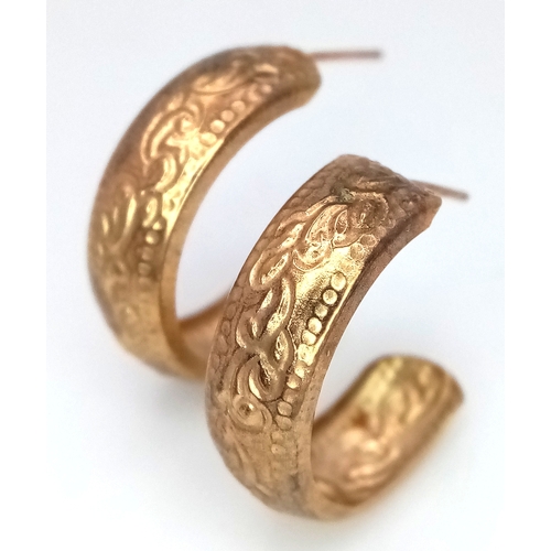 961 - A Pair of 9K Gold Three Quarter Hoop Earrings. No backs. 0.72g.