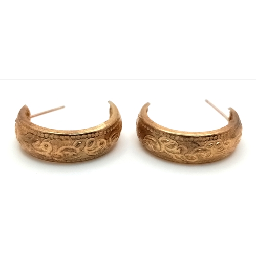 961 - A Pair of 9K Gold Three Quarter Hoop Earrings. No backs. 0.72g.