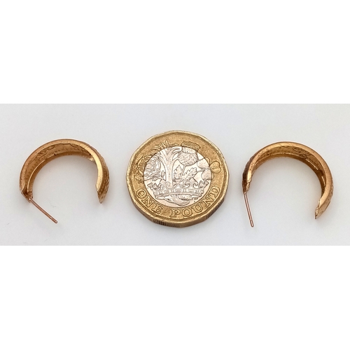 961 - A Pair of 9K Gold Three Quarter Hoop Earrings. No backs. 0.72g.