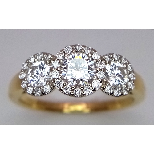 135 - A Breath-Taking 18K Yellow Gold Diamond Cluster Ring. Three round brilliant cut diamonds with diamon... 