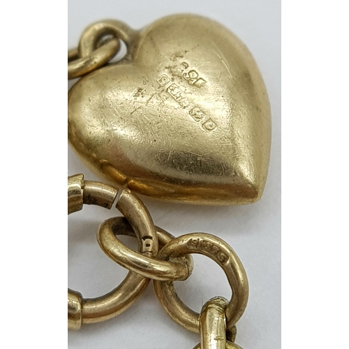 141 - A Vintage 9K Yellow Gold Link Bracelet with Heart Charm. 18cm. 4.9g.