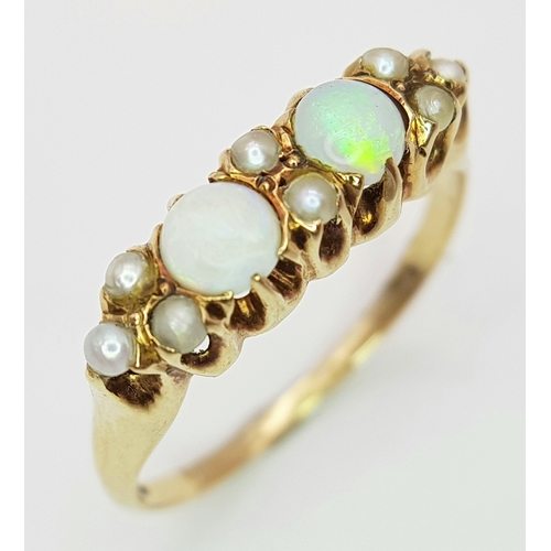 556 - A 14k yellow gold Opal and Pearl ring, 8x1cm pearls, 2x4cm opals, 2.9g total weight, ring size L. 89... 