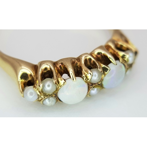 556 - A 14k yellow gold Opal and Pearl ring, 8x1cm pearls, 2x4cm opals, 2.9g total weight, ring size L. 89... 