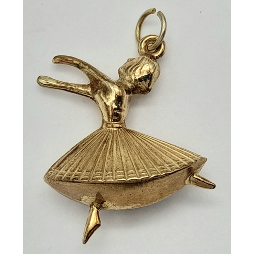 562 - A 9K Yellow Gold Ballerina Pendant/charm. 2.5cm. 1.4g.