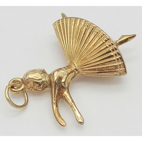 562 - A 9K Yellow Gold Ballerina Pendant/charm. 2.5cm. 1.4g.
