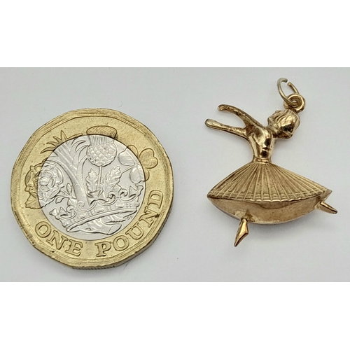 562 - A 9K Yellow Gold Ballerina Pendant/charm. 2.5cm. 1.4g.
