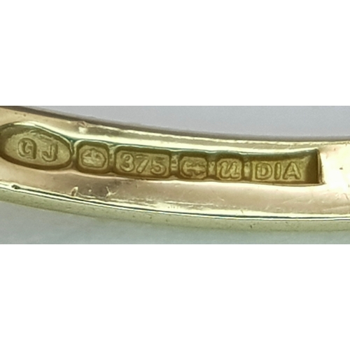 563 - A 9k yellow gold diamond vintage ring, 0.35ct diamond weight, 3.8g total weight, ring size V. 2172I