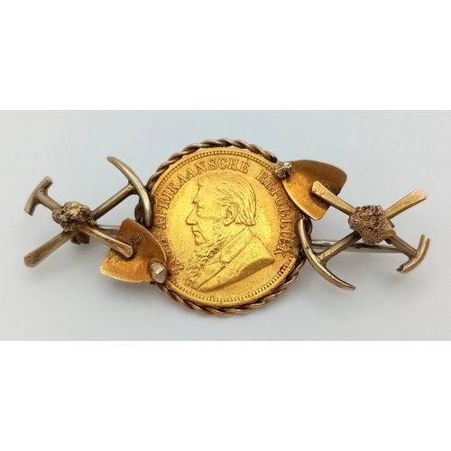 584 - An 1895 South African 1/2 Pond Gold Coin Brooch. Decorated with mining motifs. 22k gold coin. 9K set... 