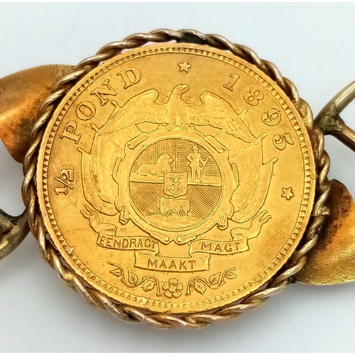 584 - An 1895 South African 1/2 Pond Gold Coin Brooch. Decorated with mining motifs. 22k gold coin. 9K set... 