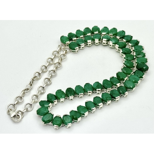 596 - An Emerald Gemstone Necklace Set in 925 silver with links for adjustment. 42cm. Cd-1935