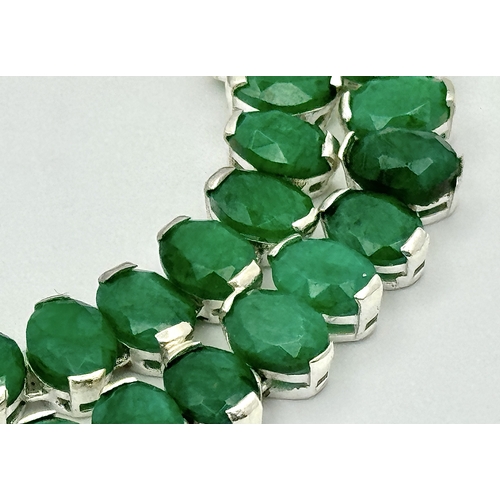 596 - An Emerald Gemstone Necklace Set in 925 silver with links for adjustment. 42cm. Cd-1935