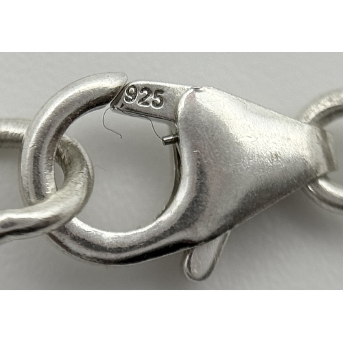 596 - An Emerald Gemstone Necklace Set in 925 silver with links for adjustment. 42cm. Cd-1935