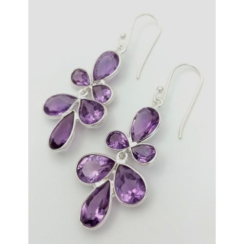 603 - A Pair of Amethyst Gemstone Drop Earrings. 4cm drop set in 925 Silver. CD-1950