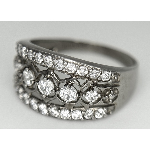 738 - A stunning 14K white gold CZ stone set ring. Total weight 3.7G. Size Q/R.