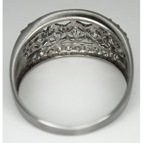 738 - A stunning 14K white gold CZ stone set ring. Total weight 3.7G. Size Q/R.