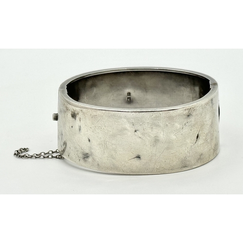 745 - An antique sterling silver click -on bangle (include safety chain). Rose gold border and yellow gold... 