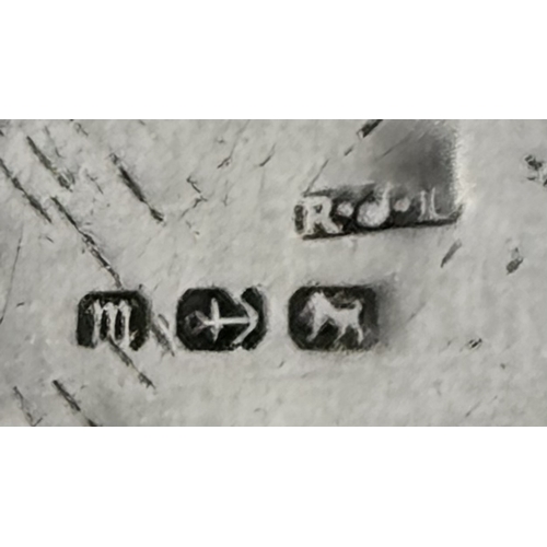 745 - An antique sterling silver click -on bangle (include safety chain). Rose gold border and yellow gold... 