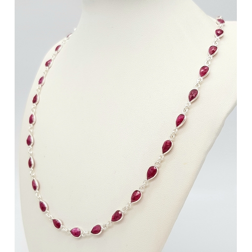 750 - A Pear Cut Ruby Gemstone Necklace. Set in 925 Silver. 58cm. 
CD-1962.