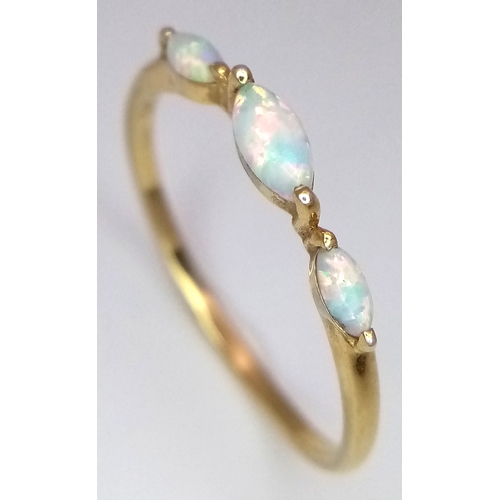 773 - A pretty 925 gilded silver Opal ring. Total weight 1.1G. Size Q/R.