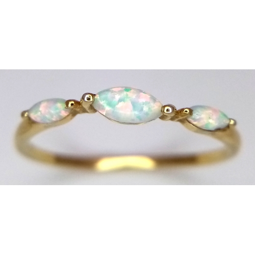773 - A pretty 925 gilded silver Opal ring. Total weight 1.1G. Size Q/R.