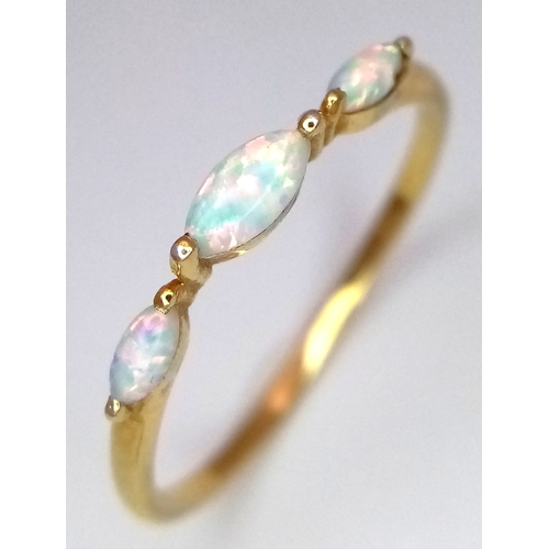 773 - A pretty 925 gilded silver Opal ring. Total weight 1.1G. Size Q/R.
