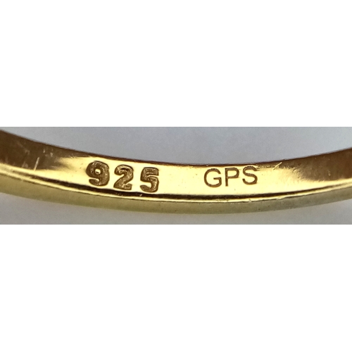 773 - A pretty 925 gilded silver Opal ring. Total weight 1.1G. Size Q/R.